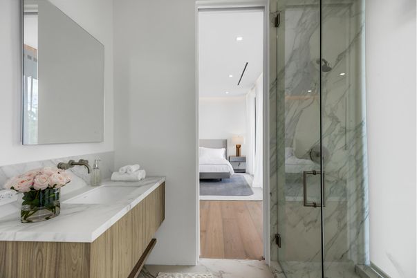 Bathroom, Bedroom, Glass Shower, Interior, Marble, Marble Walls, Recessed Lighting, Wood Texture Flooring