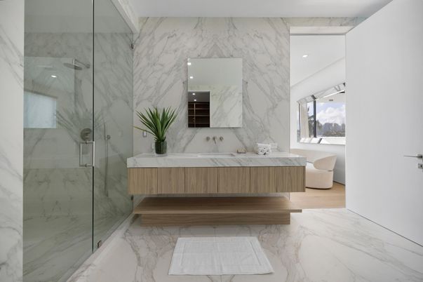 Bathroom, Dual Sink Vanities, Glass Shower, Interior, Marble, Marble Walls, Recessed Lighting