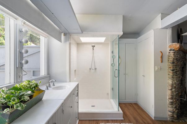 Bathroom, Dual Sink Vanities, Glass Shower, Interior, Wood Texture Flooring