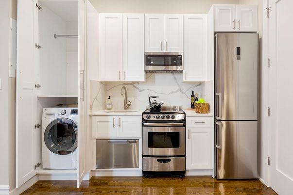 Interior, Kitchen, Marble Walls, Stainless Steel Appliances, Utility Closets, Washer, Wood Texture Flooring