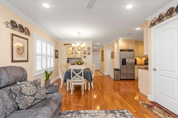 Chandelier, Dining room, Interior, Kitchen, Living room, Recessed Lighting, Stainless Steel Appliances, Wood Texture Flooring