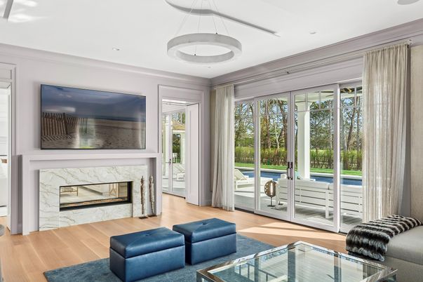 Fireplace, Interior, Living room, Pendant Lights, Recessed Lighting, Sun Room, Wood Texture Flooring