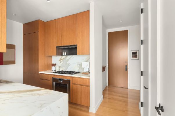 Interior, Kitchen, Marble Walls, Recessed Lighting, Stainless Steel Appliances, Wood Texture Flooring