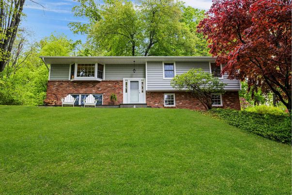 Exterior, Facade, Brick Facade, Raised Ranch