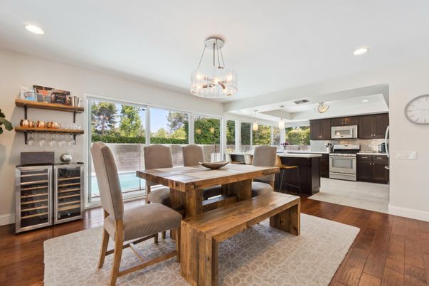 Dining room, Interior, Kitchen, Pendant Lights, Recessed Lighting, Stainless Steel Appliances, Wood Texture Flooring