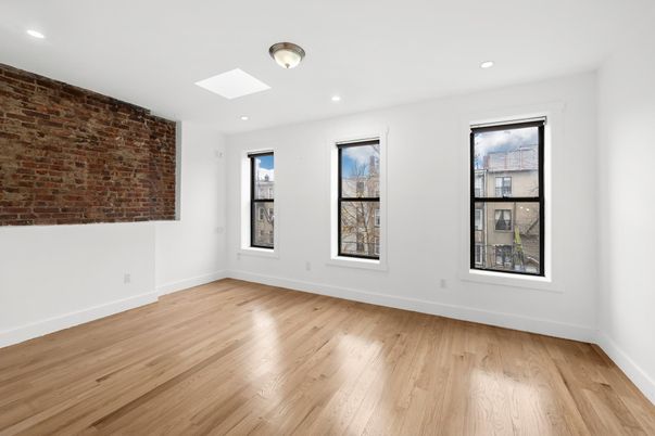 Empty room, Interior, Recessed Lighting, Stone Walls, Wood Texture Flooring