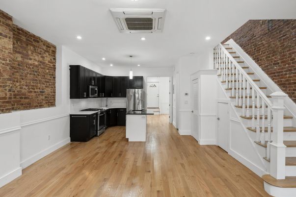 Interior, Kitchen, Pendant Lights, Recessed Lighting, Stainless Steel Appliances, Stone Walls, Wood Texture Flooring