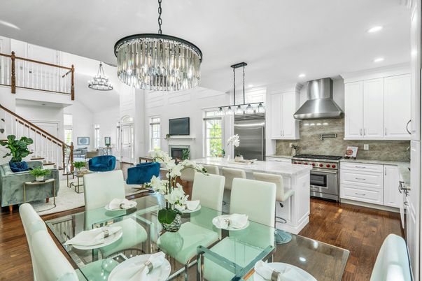 Chandelier, Dining room, Fireplace, Interior, Kitchen, Pendant Lights, Recessed Lighting, Stainless Steel Appliances, Wood Texture Flooring