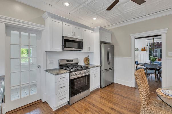 Dining room, Interior, Kitchen, Recessed Lighting, Stainless Steel Appliances, Wood Texture Flooring