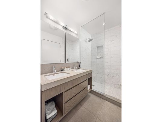 Bathroom, Dual Sink Vanities, Glass Shower, Interior, Marble Walls, Recessed Lighting
