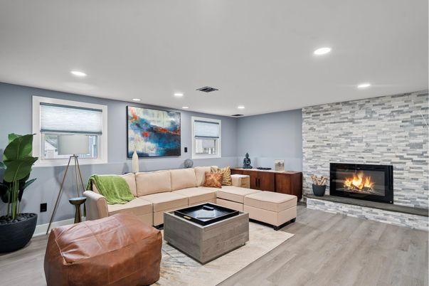 Fireplace, Interior, Living room, Recessed Lighting, Stone Walls, Wood Texture Flooring