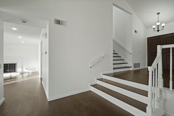 Chandelier, Fireplace, Interior, Recessed Lighting, Wood Texture Flooring