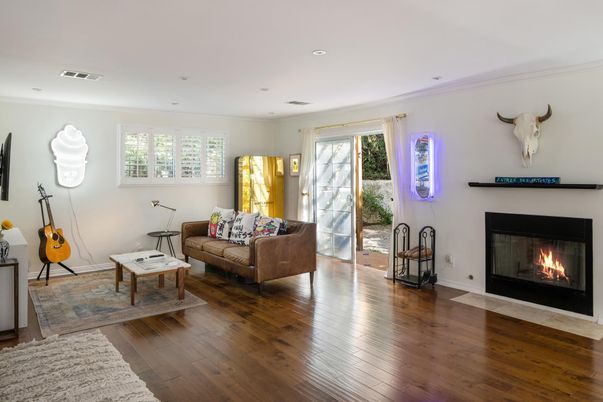 Fireplace, Interior, Living room, Piano, Recessed Lighting, Wood Texture Flooring