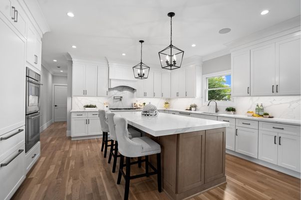 Interior, Kitchen, Marble Walls, Pendant Lights, Recessed Lighting, Stainless Steel Appliances, Wood Texture Flooring