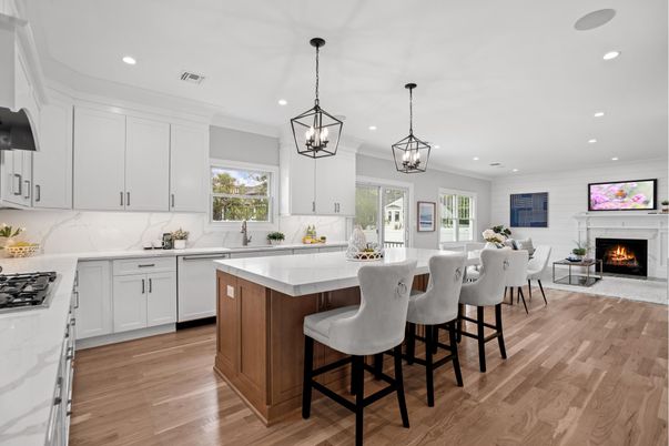 Dining room, Fireplace, Interior, Kitchen, Pendant Lights, Recessed Lighting, Stainless Steel Appliances, Wood Texture Flooring