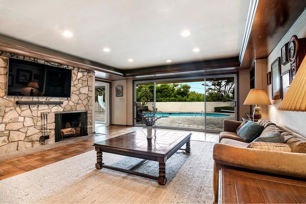 Fireplace, Interior, Living room, Recessed Lighting, Stone Walls, Wood Texture Flooring