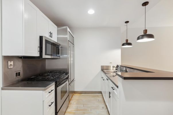 Interior, Kitchen, Pendant Lights, Recessed Lighting, Stainless Steel Appliances, Wood Texture Flooring