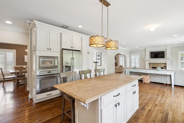 Dining room, Fireplace, Interior, Kitchen, Living room, Pendant Lights, Recessed Lighting, Stainless Steel Appliances, Wood Texture Flooring