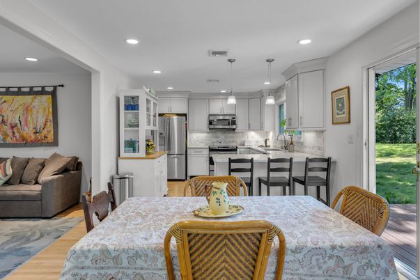 Dining room, Interior, Kitchen, Pendant Lights, Recessed Lighting, Stainless Steel Appliances, Wood Texture Flooring