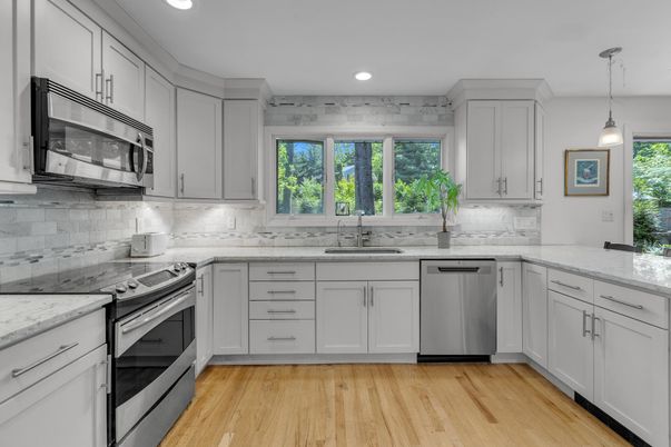 Interior, Kitchen, Pendant Lights, Recessed Lighting, Stainless Steel Appliances, Wood Texture Flooring