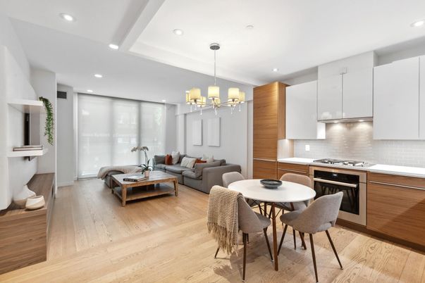 Chandelier, Dining room, Interior, Kitchen, Living room, Recessed Lighting, Stainless Steel Appliances, Wood Texture Flooring