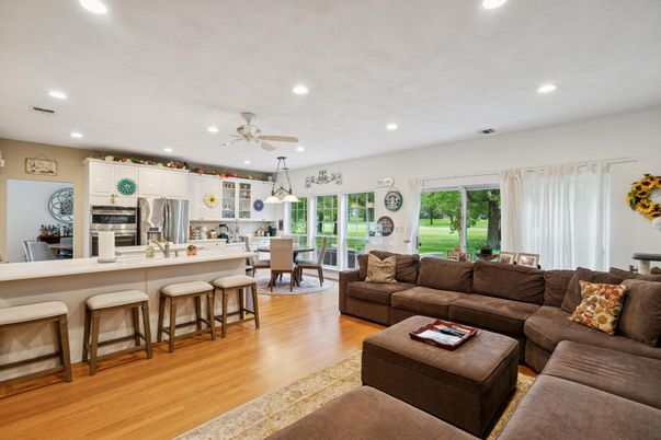Dining room, Interior, Kitchen, Living room, Pendant Lights, Recessed Lighting, Stainless Steel Appliances, Wood Texture Flooring