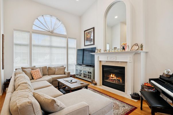 Fireplace, Interior, Living room, Piano, Recessed Lighting, Wood Texture Flooring