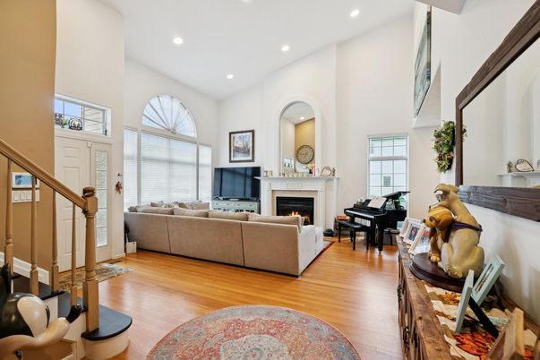 Fireplace, Interior, Living room, Piano, Recessed Lighting, Wood Texture Flooring