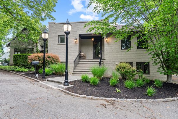 Exterior, Facade, Brick Facade, Raised Ranch