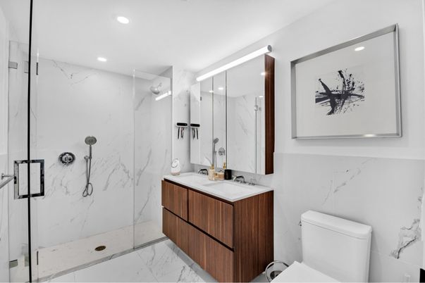 Bathroom, Dual Sink Vanities, Glass Shower, Interior, Marble, Marble Walls, Recessed Lighting