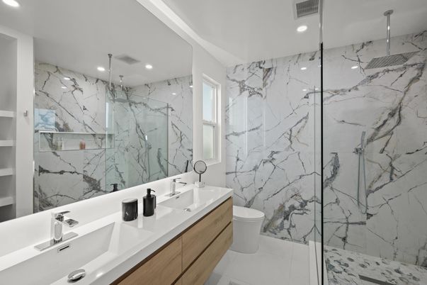 Bathroom, Dual Sink Vanities, Glass Shower, Interior, Marble Walls, Recessed Lighting