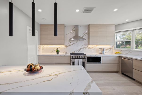 Interior, Kitchen, Marble Walls, Recessed Lighting, Stainless Steel Appliances, Wood Texture Flooring