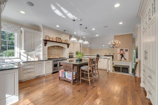 Chandelier, Fireplace, Interior, Kitchen, Pendant Lights, Recessed Lighting, Stainless Steel Appliances, Wood Texture Flooring