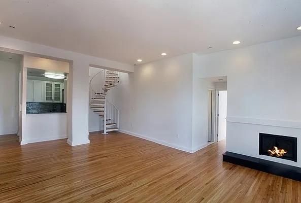 Empty room, Fireplace, Interior, Recessed Lighting, Wood Texture Flooring