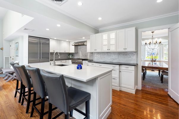 Chandelier, Dining room, Interior, Kitchen, Recessed Lighting, Stainless Steel Appliances, Wood Texture Flooring