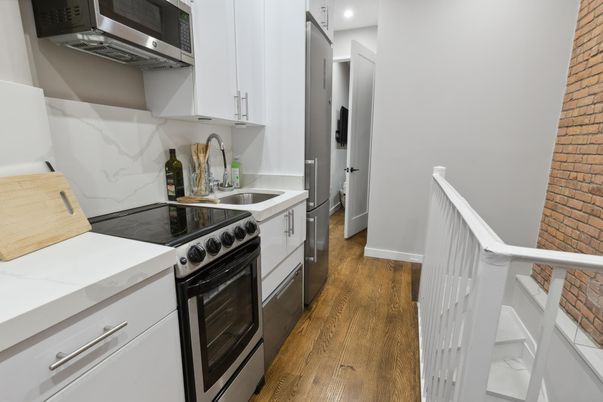 Interior, Kitchen, Marble Walls, Recessed Lighting, Wood Texture Flooring