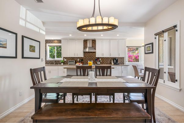 Chandelier, Dining room, Interior, Kitchen, Pendant Lights, Recessed Lighting, Stainless Steel Appliances, Wood Texture Flooring
