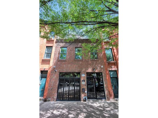 Exterior, Facade, Brick Facade, Condo Building