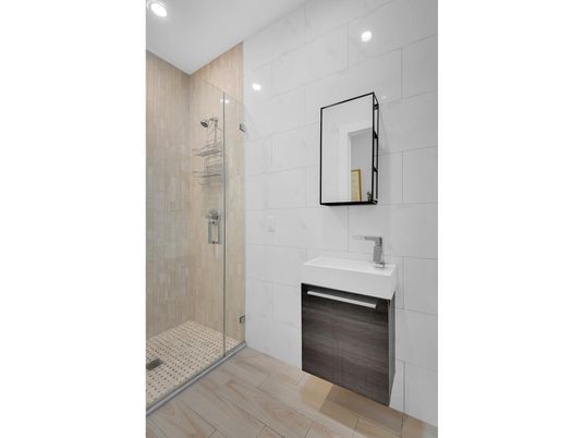 Bathroom, Glass Shower, Interior, Marble Walls, Recessed Lighting, Wood Texture Flooring