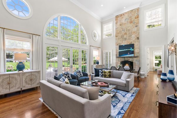 Fireplace, Interior, Living room, Recessed Lighting, Stone Walls, Wood Texture Flooring