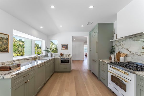 Interior, Kitchen, Marble Walls, Recessed Lighting, Stainless Steel Appliances, Wood Texture Flooring