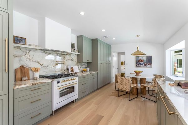 Dining room, Interior, Kitchen, Marble Walls, Pendant Lights, Recessed Lighting, Stainless Steel Appliances, Wood Texture Flooring