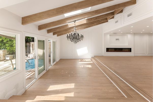 Chandelier, Empty room, Fireplace, Interior, Recessed Lighting, Wooden Beams, Wood Texture Flooring