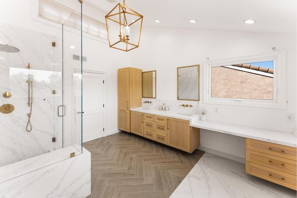 Bathroom, Dual Sink Vanities, Glass Shower, Interior, Marble, Marble Walls, Pendant Lights, Recessed Lighting, Wood Texture Flooring