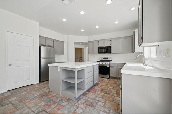 Interior, Kitchen, Recessed Lighting, Stainless Steel Appliances, Tile Countertops