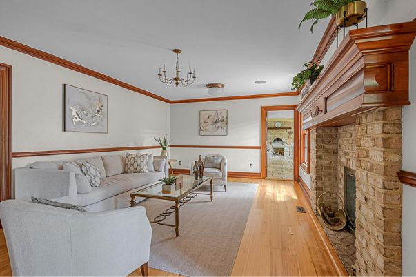 Chandelier, Fireplace, Interior, Living room, Stone Walls, Wood Texture Flooring