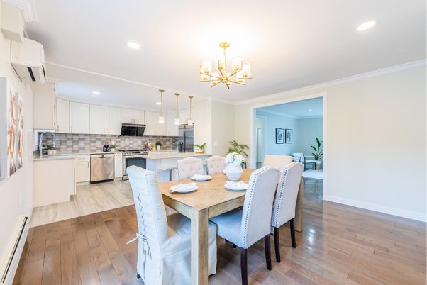 Dining room, Interior, Kitchen, Pendant Lights, Recessed Lighting, Stainless Steel Appliances, Wood Texture Flooring