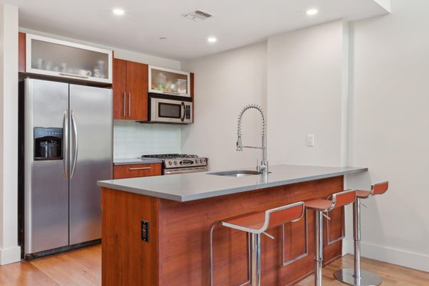 Interior, Kitchen, Recessed Lighting, Stainless Steel Appliances, Wood Texture Flooring