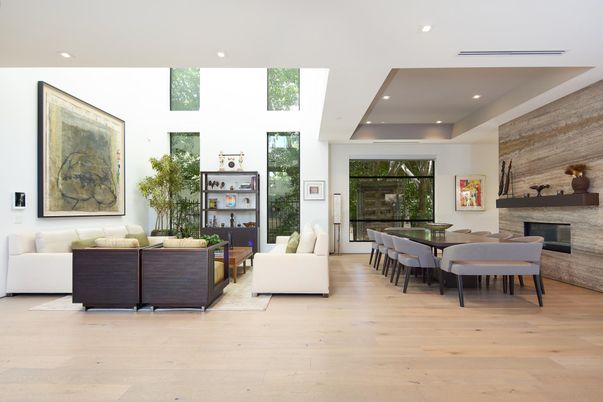 Dining room, Fireplace, Interior, Living room, Recessed Lighting, Stone Walls, Wood Texture Flooring