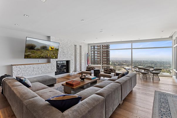 Fireplace, Interior, Living room, Recessed Lighting, Stone Walls, Wood Texture Flooring
